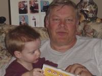 14FEB03_04grandpa_reading <?xml version=